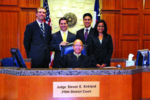 Inset: Kirkland in his former courtroom with 2011 interns (from right) Anthony Clarkson, Keith Toler, Cristian Rosas-Grillet, and Sireesha Chirala.