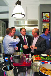 Fleming attack: Kirkland (with “drink” in hand) had attack ads railed against him by his opponent in 2012. The one above frames Kirkland as an active drinker with recent DWI charges, when in reality, Kirkland’s glass is filled with mineral water and he was 28 years sober when the ad was released.