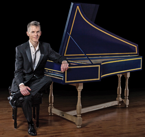 The melody lingers on: Matthew Dirst is the founder and artistic director of the Houston early-music group Ars Lyrica. Photo by Amitava Sarkar. Inset: Dirst with his partner, Sixto Wagan.