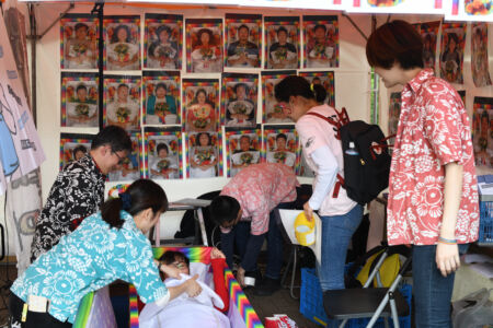 #7 One of the most popular booths contained a neon rainbow coffin for guests to lie down inside, take a deep breath, and close their eyes for a moment of healing meditation. Some guests even chose to hold a bouquet of flowers. The coffin lid would then be carefully closed for a minute of silent prayer. Once the lid was reopened, a photo would be taken to symbolize the participant’s rebirth. This process intrigued many festival-goers, and provided a way for guests to leave past selves or old wounds behind.