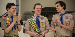 Pascal Tessier (center),  a gay scout in Maryland, achieved the highest rank of Eagle Scout. Photo: The Washington Post via Getty Images